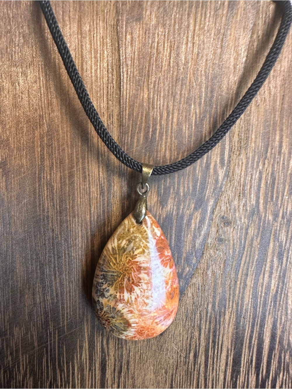Orange and Black Coral Fossil Teardrop Pendant Necklace on Black Rope - Picture 12 of 16
